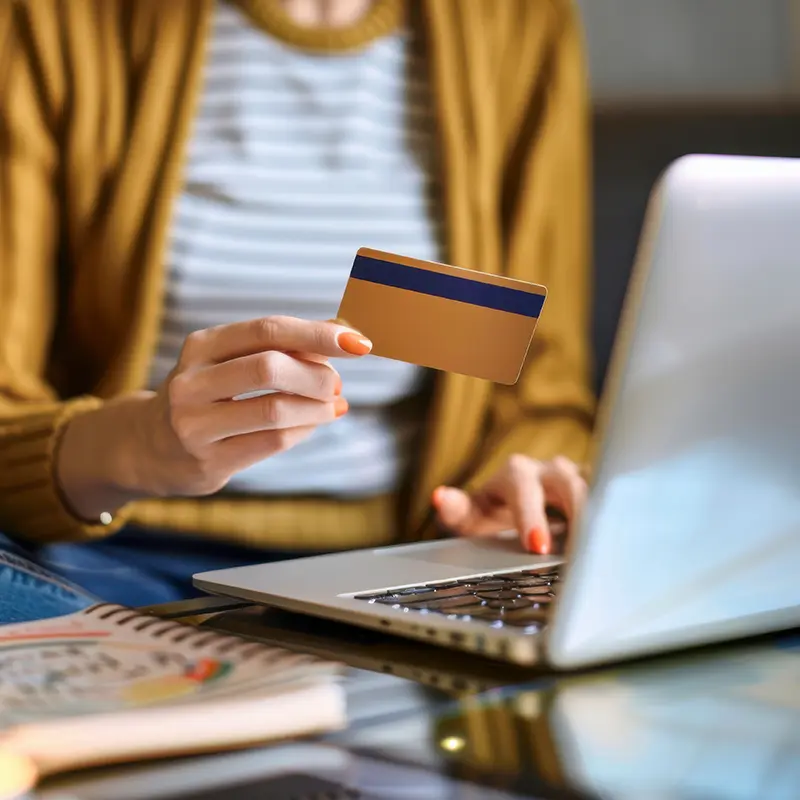 woman holding credit card
